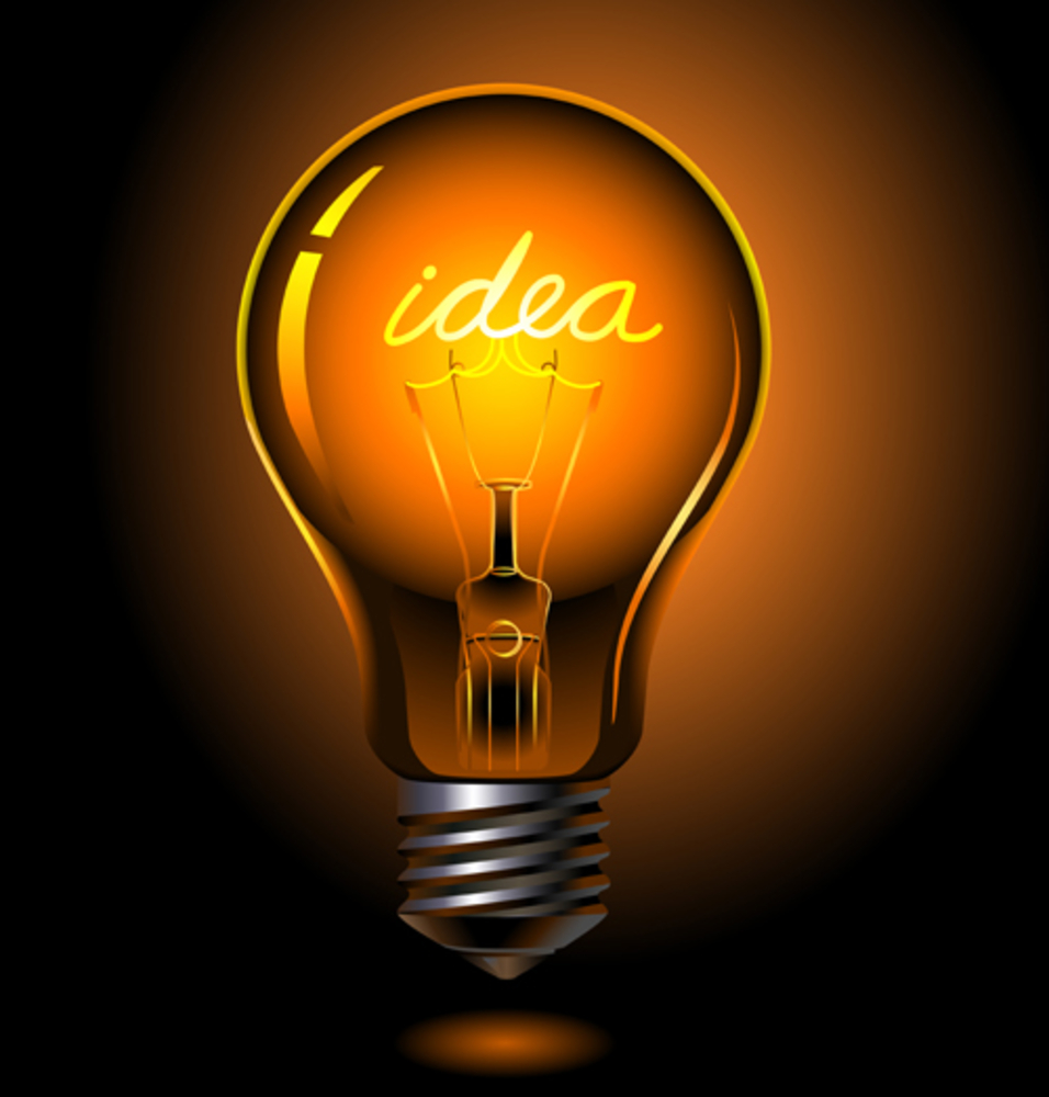Glowing light bulb with the word idea